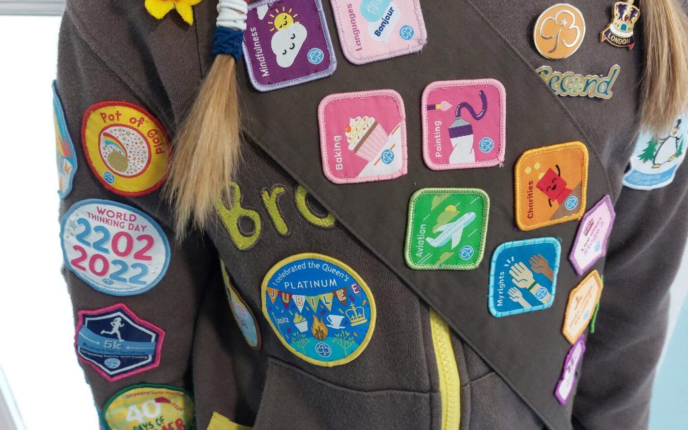 Brownie Emma with badges