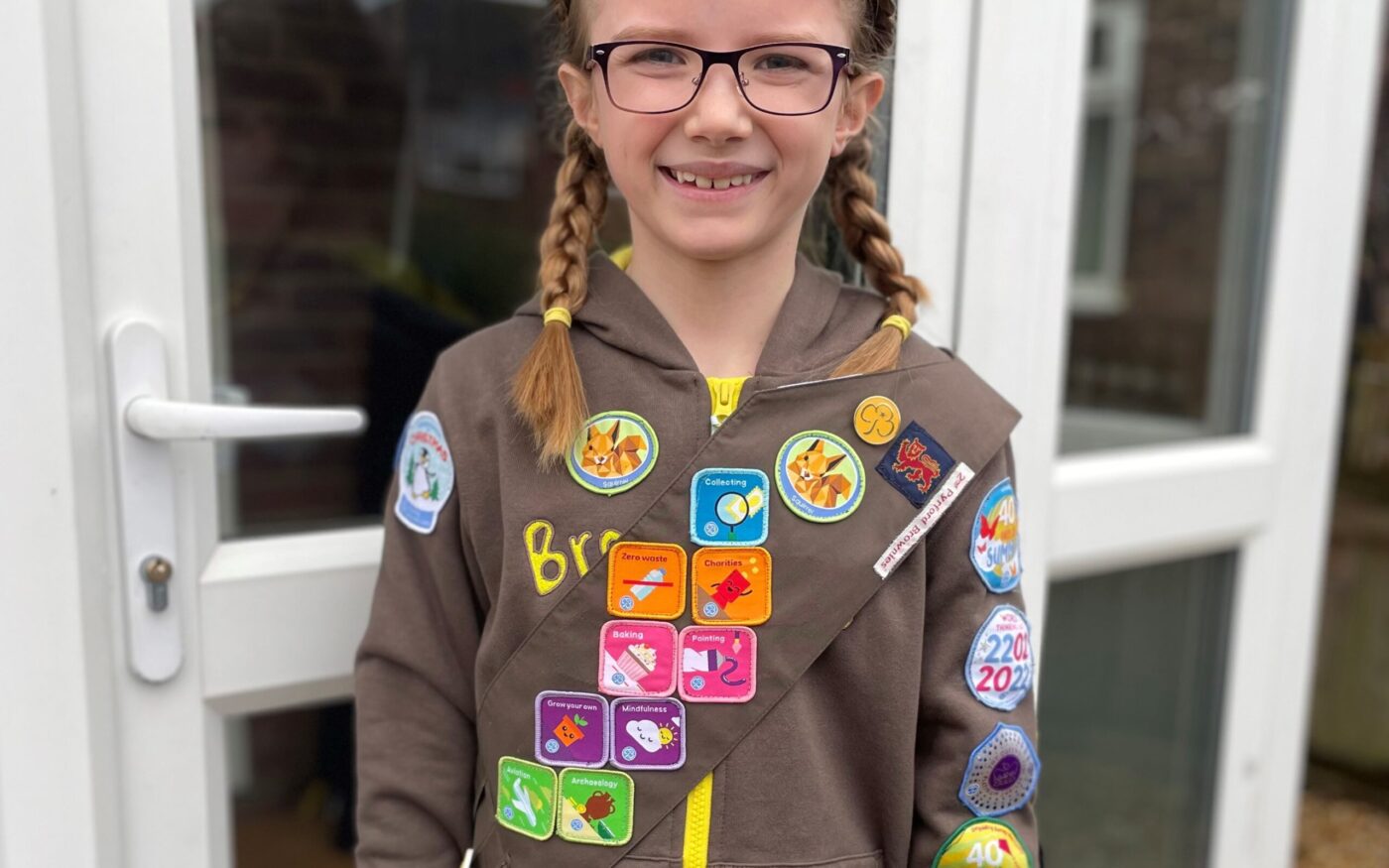 Brownie Emma with badges