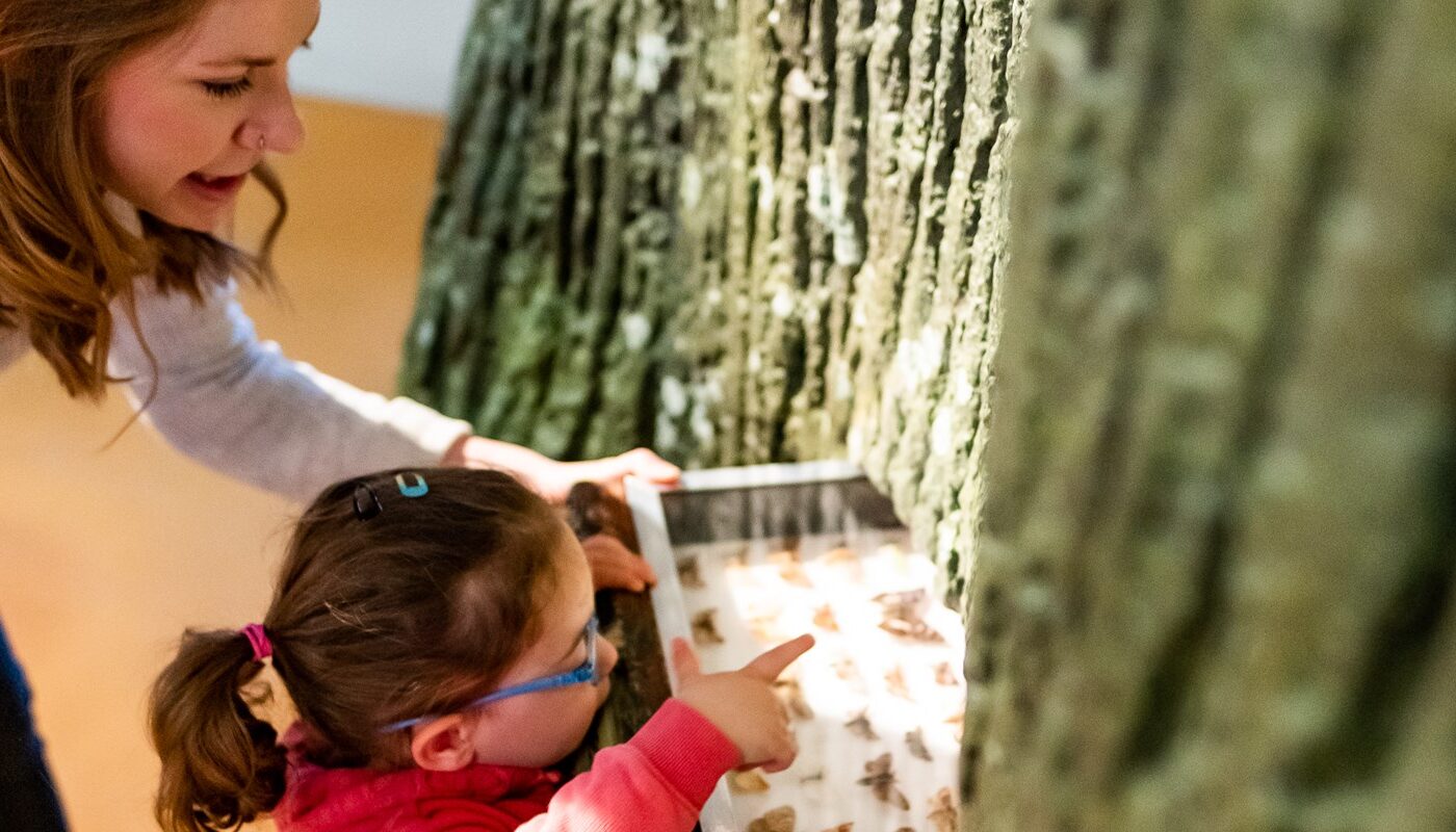 A young visitor explores Adventure Planet with one of our curators. © Andy Catlin