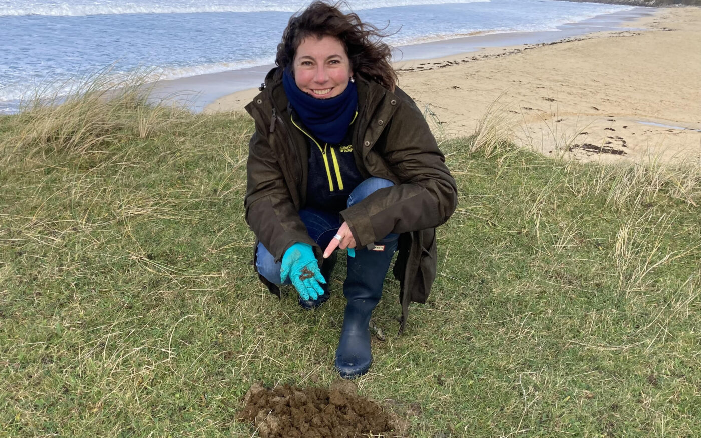 Sally-Ann shows off a handful of dung beetles